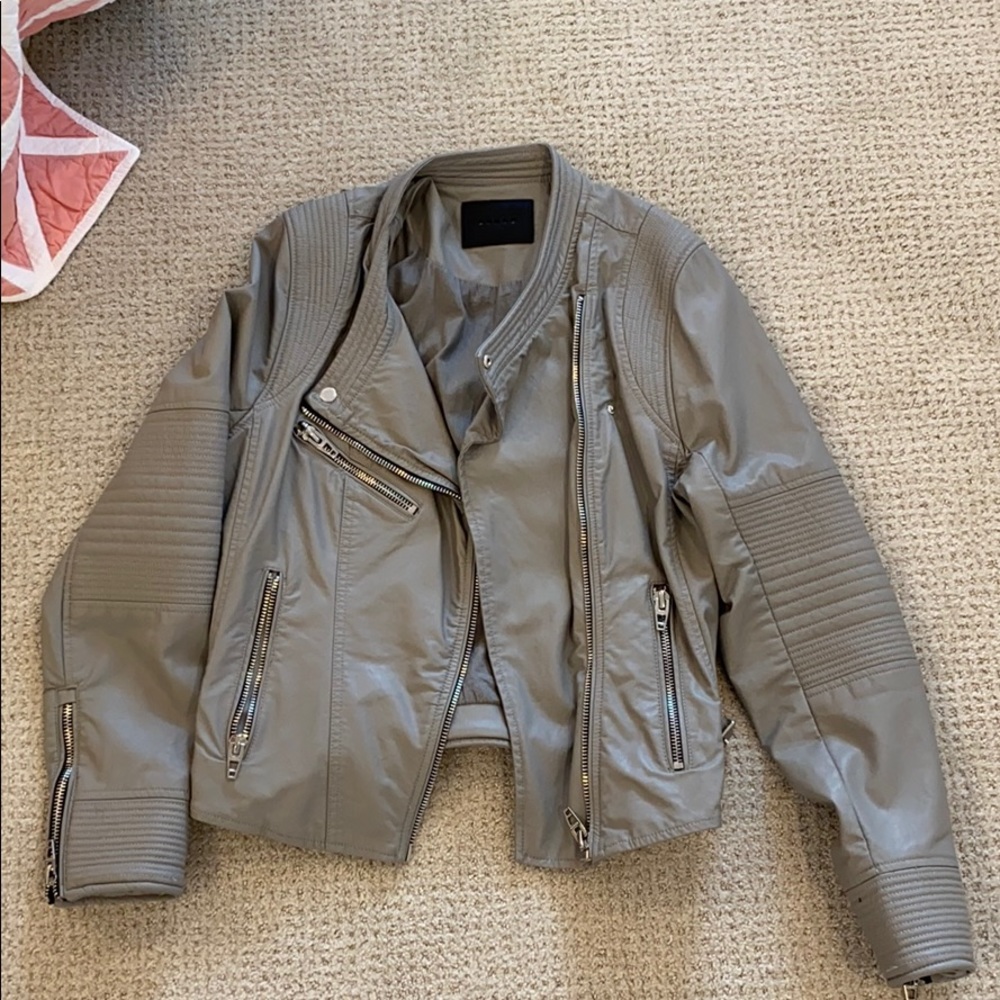 Grey leather jacket.